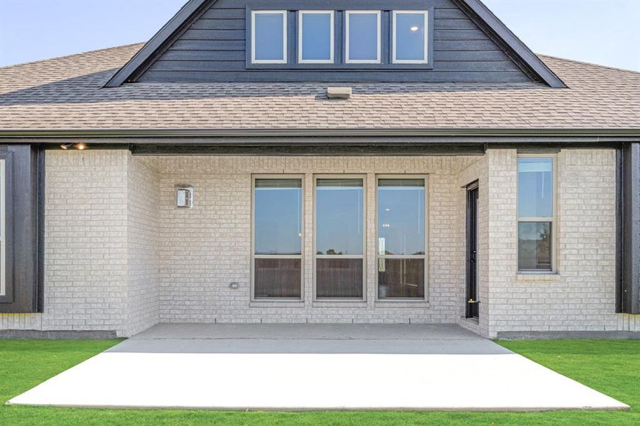 Exterior details and patio area of a home in Stone River Glen 60s, Royse City (Image 18). Exterior details and patio area of a home in Stone River Glen 60s, Royse City (Image 18).