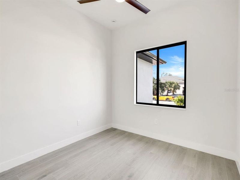 Spacious, unfurnished interior of a new home in , Port Charlotte (Image 9).