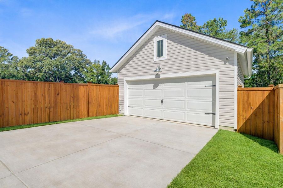 Exterior details and patio area of a home in Limehouse Village: Row Collection, Summerville (Image 4).