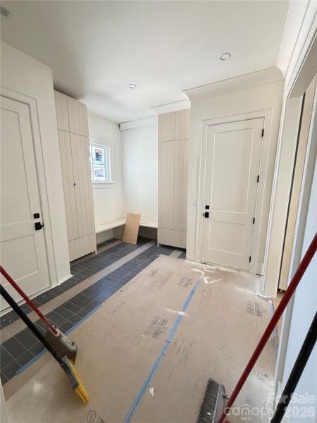 Mudroom off both gargags.