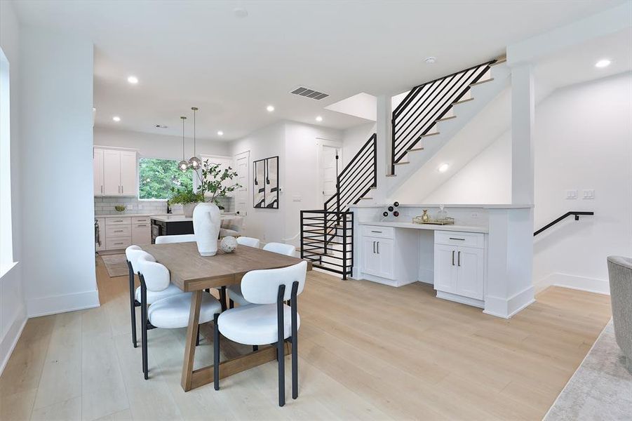 Modern kitchen with panoramic Houston skyline views.