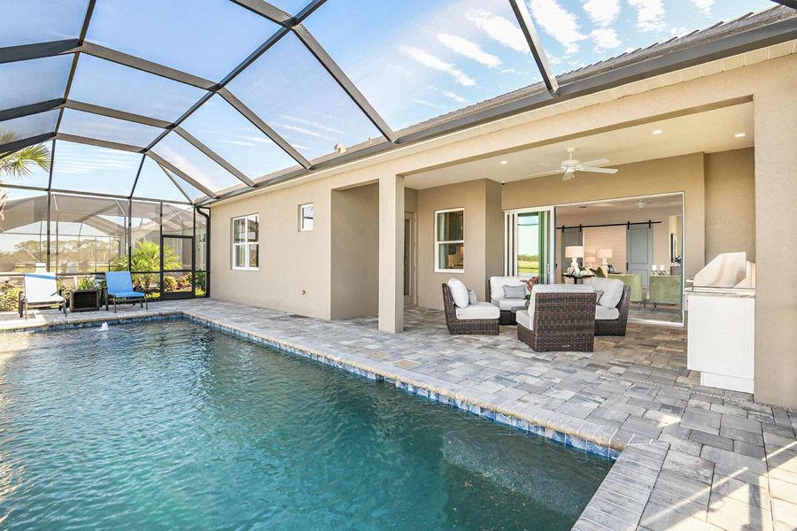 Exterior details and patio area of a home in Palm Grove, Lakewood Ranch (Image 2).