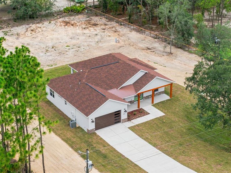 Front exterior of a new home in , Dunnellon, FL, highlighting curb appeal (Image 21). Front exterior of a new home in , Dunnellon, FL, highlighting curb appeal (Image 21).