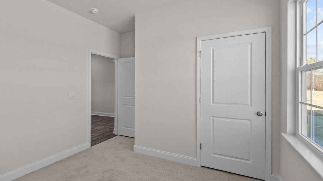 Spacious, unfurnished interior of a new home in Bedford Place, Wilson (Image 9). Spacious, unfurnished interior of a new home in Bedford Place, Wilson (Image 9).