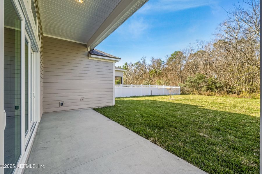 Exterior details and patio area of a home in Silver Landing at SilverLeaf, St. Augustine (Image 29).
