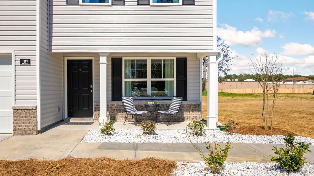 Exterior details and patio area of a home in Fox Hollow, Dalton (Image 3).
