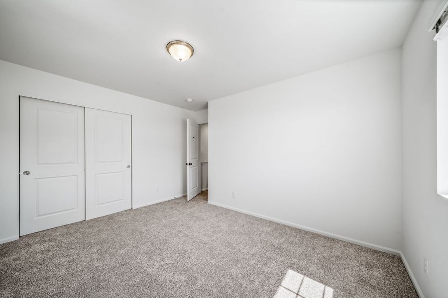 Spacious, unfurnished interior of a new home in Muegge Farms, Bennett (Image 9).