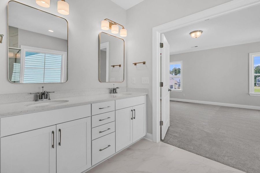 Furnished interior view inside a new home in Tidewater at Lakes of Cane Bay, Summerville (Image 7).