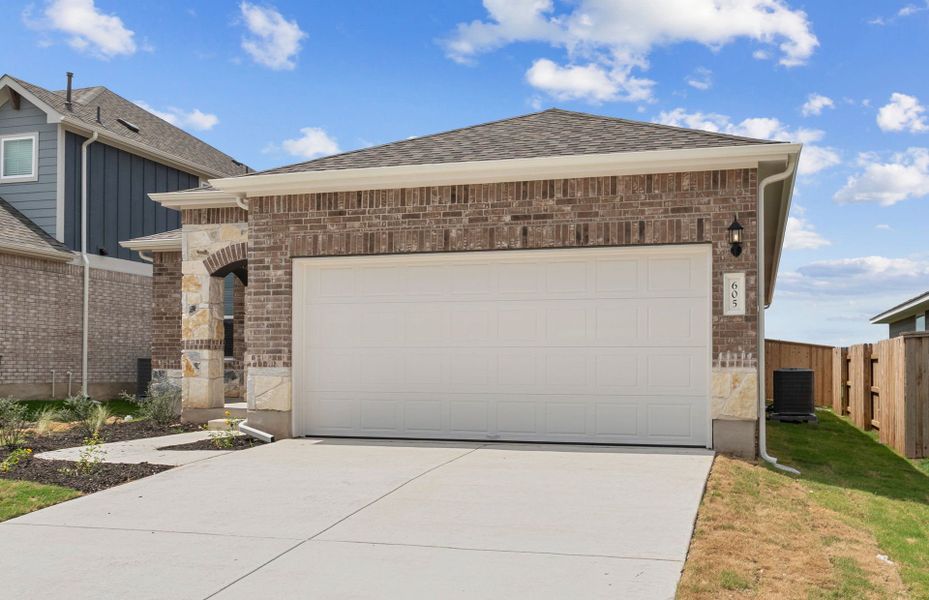 Front exterior of a new home in Patterson Ranch, Georgetown, TX, highlighting curb appeal (Image 16).