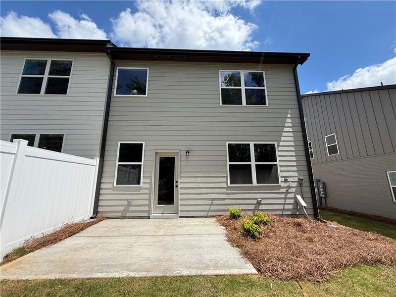 Exterior details and patio area of a home in The Towns at Auburn Station East, Auburn (Image 3).