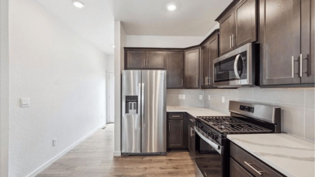 Representative furnished interior of a home built from the Elbert by D.R. Horton in Sky Ranch, Watkins (Image 6). Representative furnished interior of a home built from the Elbert by D.R. Horton in Sky Ranch, Watkins (Image 6).