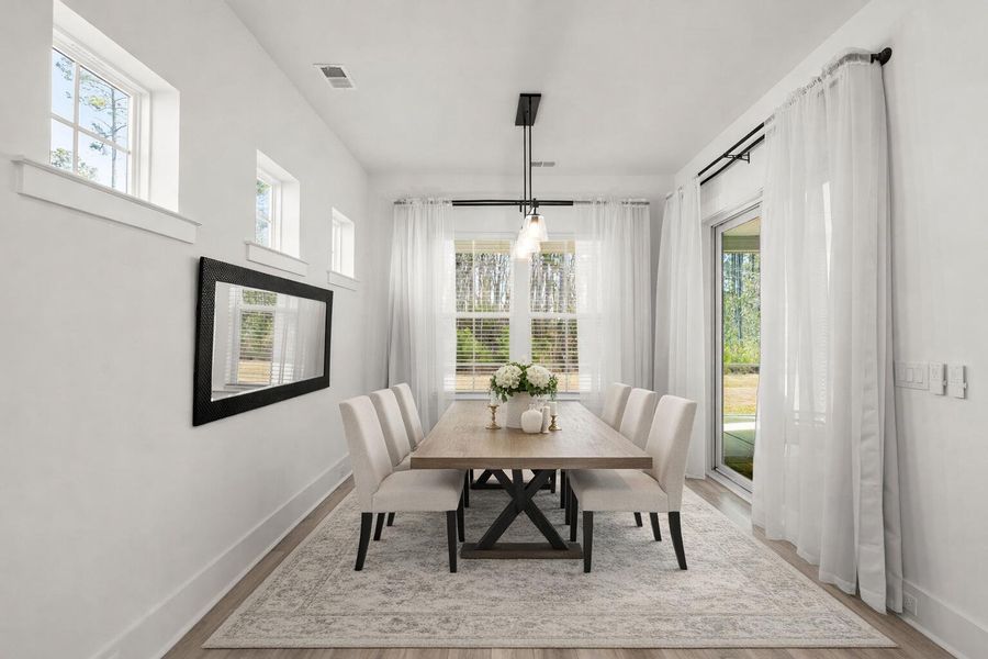 Furnished interior view inside a new home in Summerwind Crossing at Lakes of Cane Bay, Summerville (Image 36).