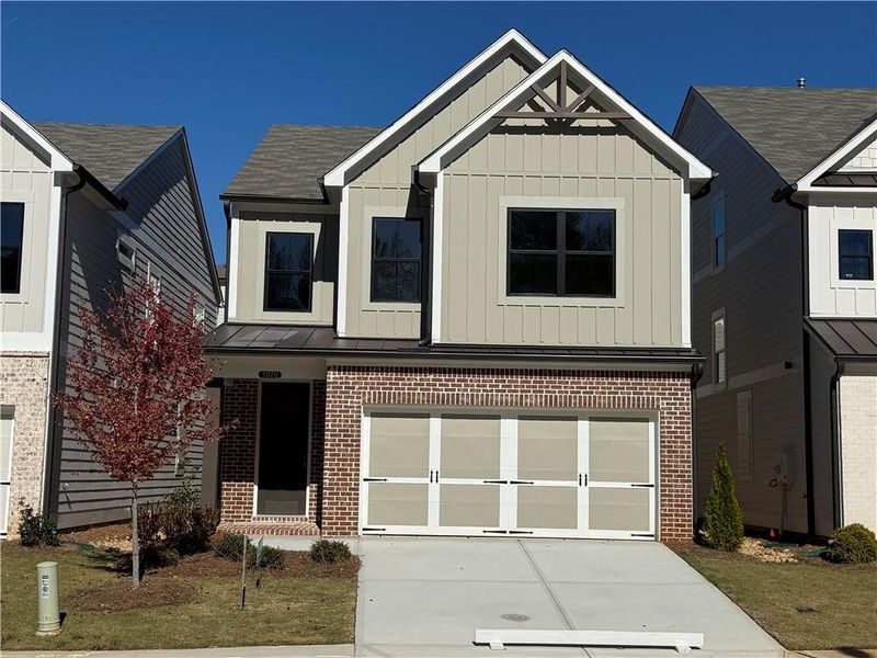 Front exterior of a new home in , Marietta, GA, highlighting curb appeal (Image 1). Front exterior of a new home in , Marietta, GA, highlighting curb appeal (Image 1).