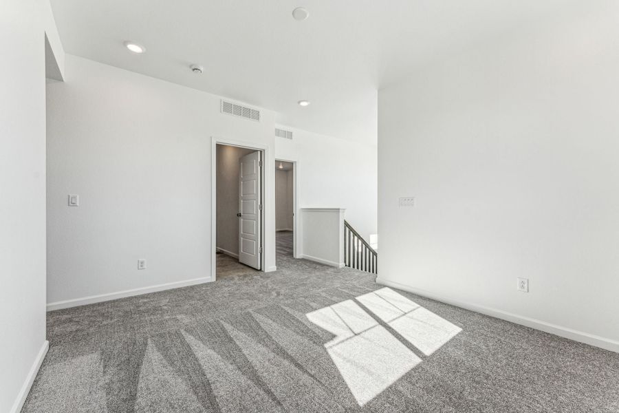 Representative unfurnished interior of a home built from the Sedalia by Taylor Morrison in Trailstone, Arvada (Image 36).