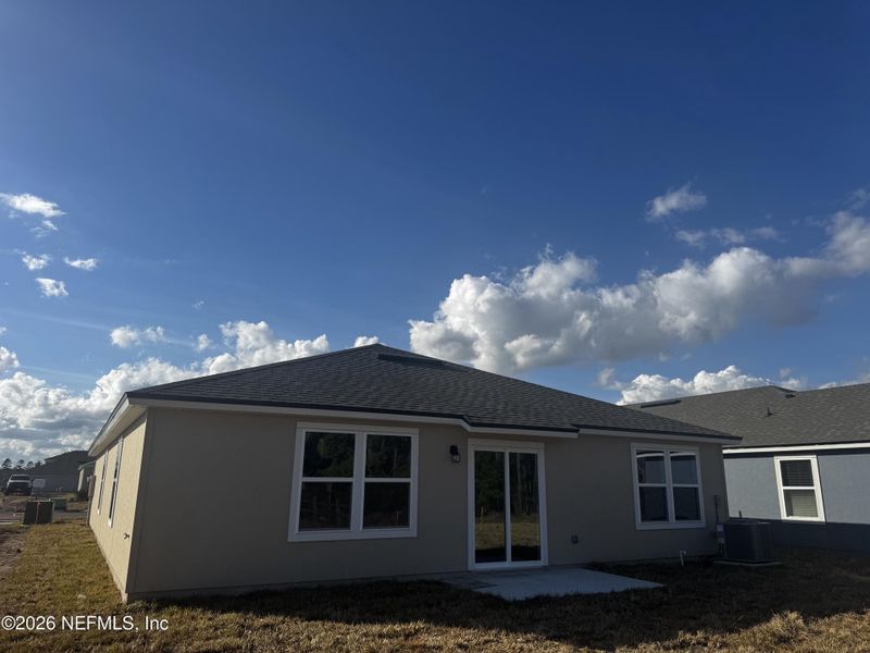 Exterior details and patio area of a home in The Arbors, Jacksonville (Image 3).