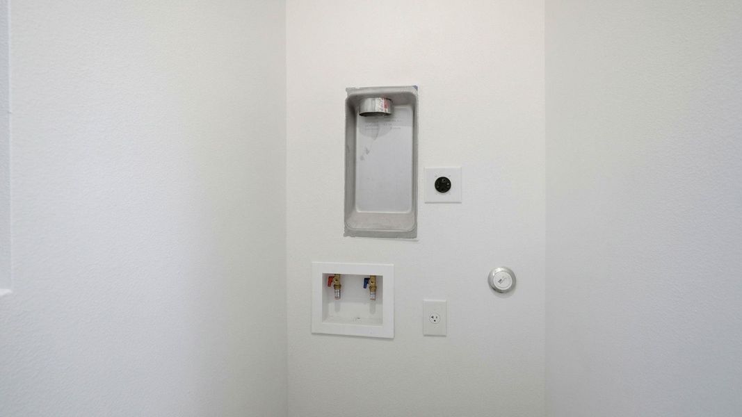 Laundry area with hookup for a gas dryer and washer hookup