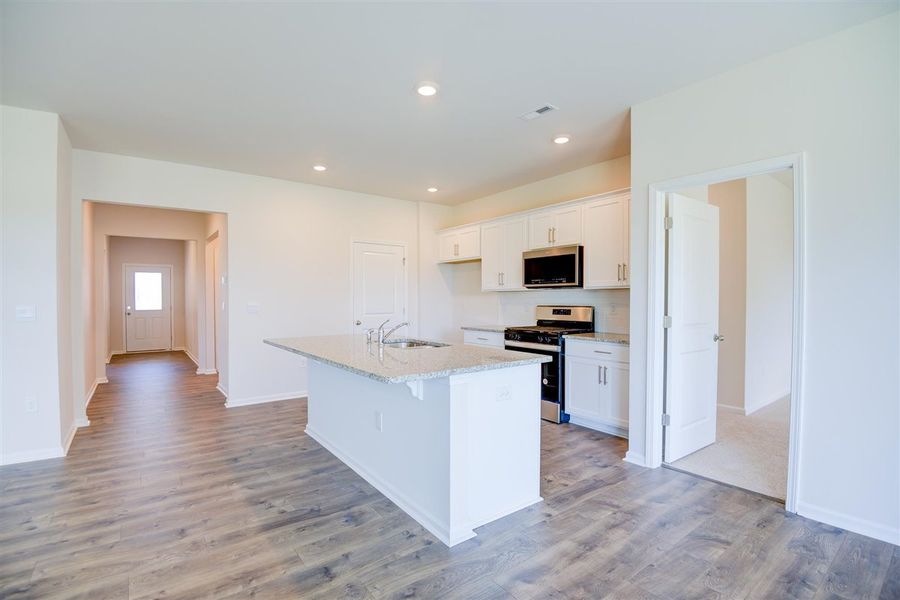 Representative furnished interior of a home built from the ARIA by D.R. Horton in West New Bern, New Bern (Image 6).