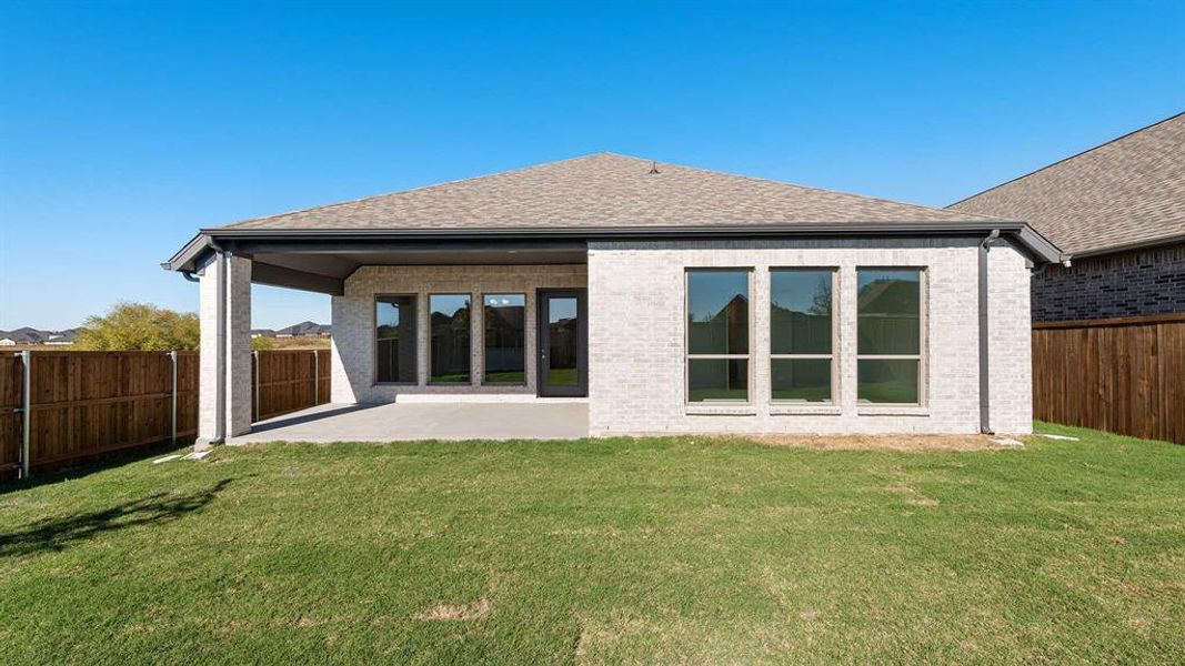 Exterior details and patio area of a home in Devonshire - Reserve 45', Forney (Image 2). Exterior details and patio area of a home in Devonshire - Reserve 45', Forney (Image 2).