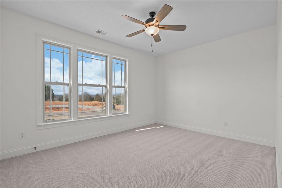 Representative unfurnished interior of a home built from the Converse by Enchanted Homes in Messer Farms, Inman (Image 32).
