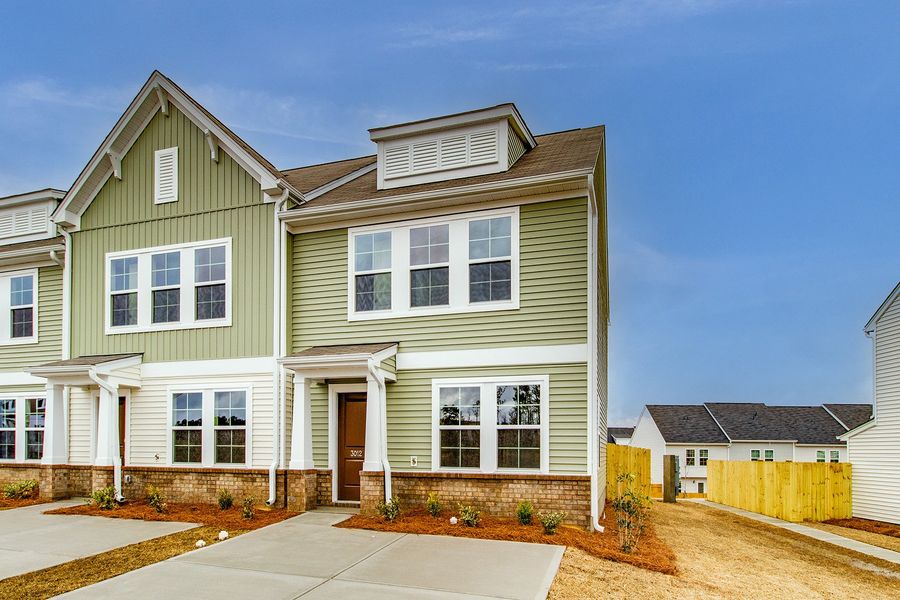 Front exterior of a new home in Astoria, Columbia, SC, highlighting curb appeal (Image 18).