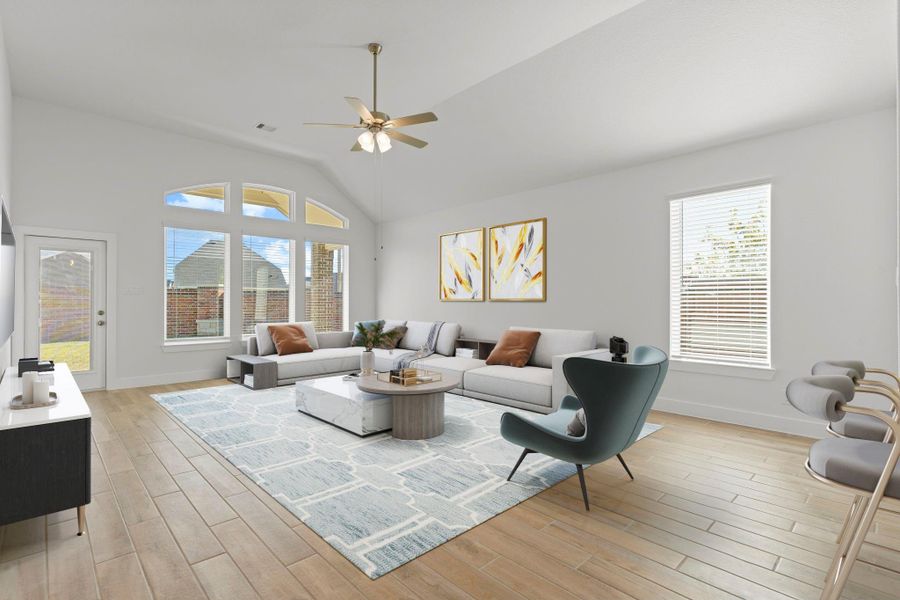 Look at those high ceilings, wall of windows looking out to your wonderful large, covered patio. *Virtually Staged*