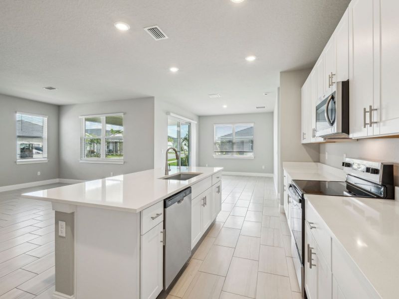 Furnished interior view inside a new home in Brystol at Wylder - Reserve Series, Port St. Lucie (Image 9).