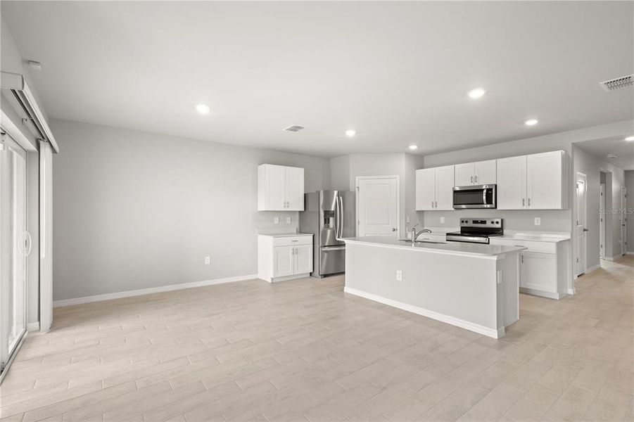 Furnished interior view inside a new home in , North Port (Image 7).