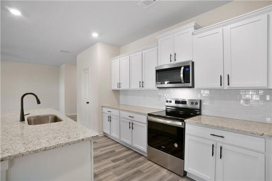 Furnished interior view inside a new home in , Buford (Image 14).