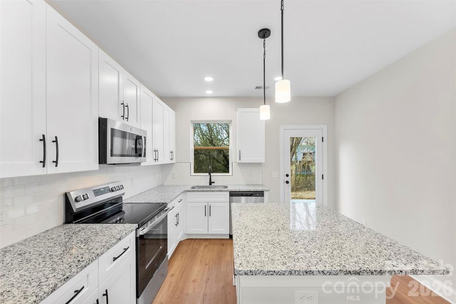 Furnished interior view inside a new home in , Hickory (Image 6).