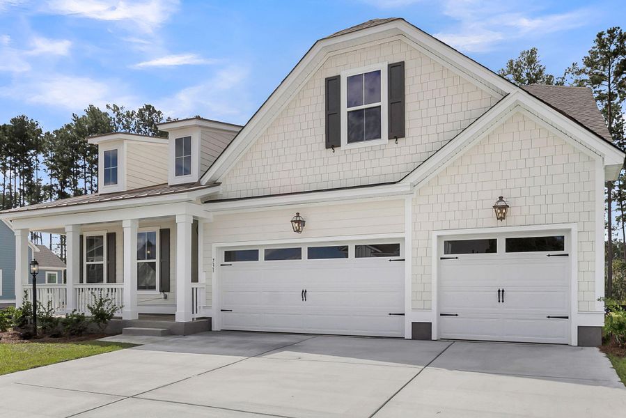 Front exterior of a new home in Tidewater at Lakes of Cane Bay, Summerville, SC, highlighting curb appeal (Image 20).