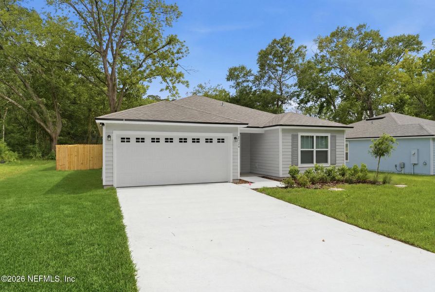 Front exterior of a new home in , Jacksonville, FL, highlighting curb appeal (Image 2). Front exterior of a new home in , Jacksonville, FL, highlighting curb appeal (Image 2).