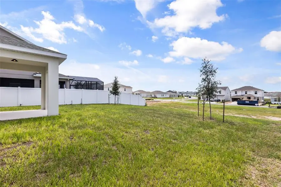 Exterior details and patio area of a home in , Groveland (Image 4).
