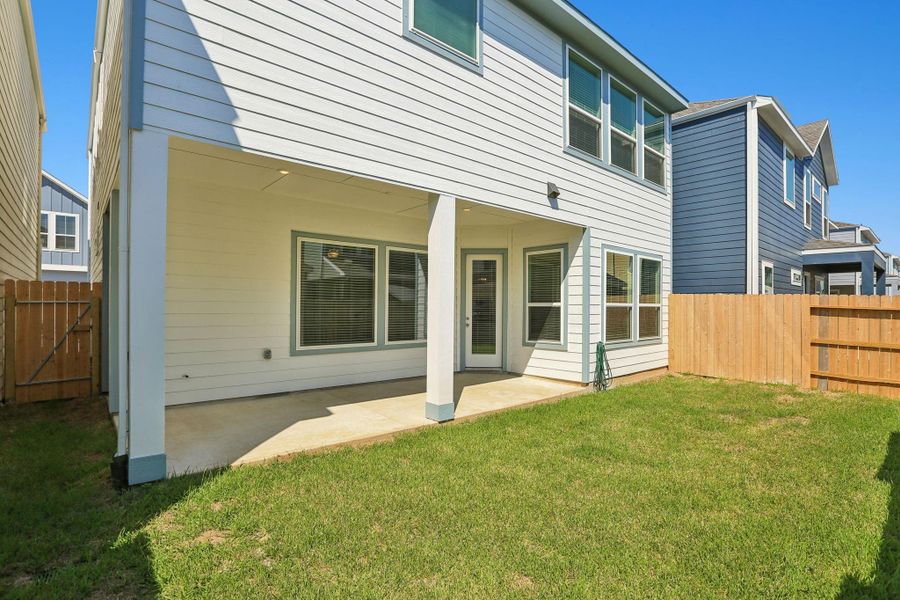 Exterior details and patio area of a home in Kemah Crossing - Luxe Series, Kemah (Image 3). Exterior details and patio area of a home in Kemah Crossing - Luxe Series, Kemah (Image 3).