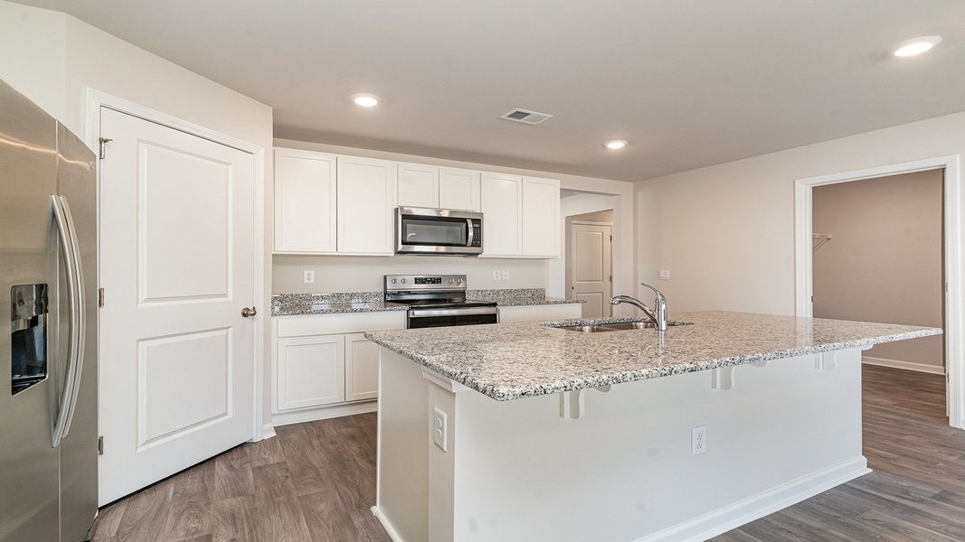 Representative furnished interior of a home built from the Dover by D.R. Horton in Pinewood Estates, Conway (Image 4).