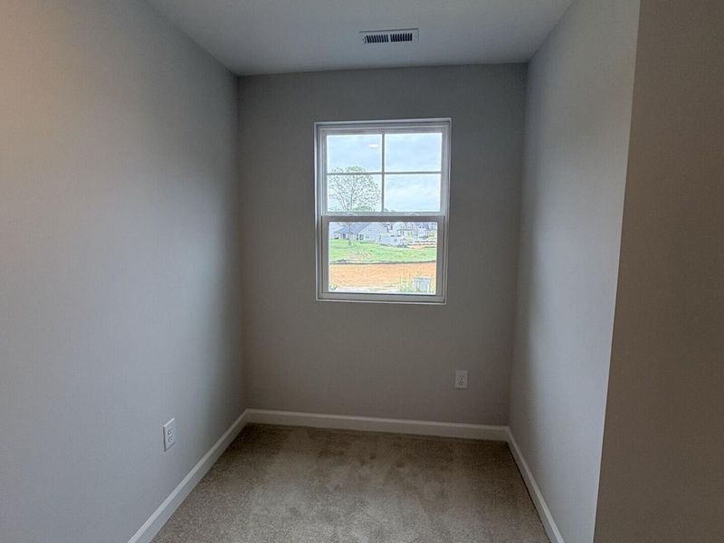 Spacious, unfurnished interior of a new home in Woodland Crossing, Zebulon (Image 17).