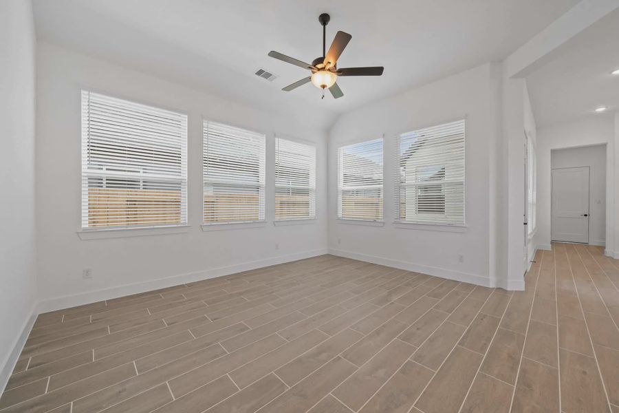 Representative unfurnished interior of a home built from the Augusta by Chesmar Homes in Riceland Alley Loads, Mont Belvieu (Image 16).