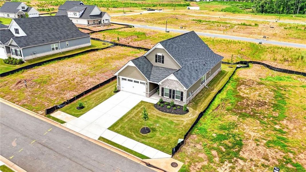 Front exterior of a new home in , McDonough, GA, highlighting curb appeal (Image 24).