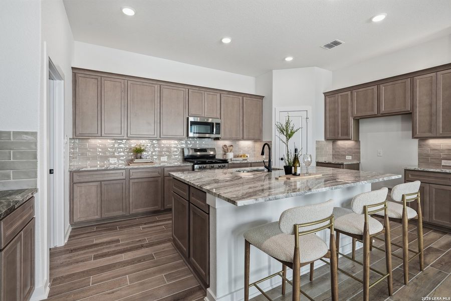Furnished interior view inside a new home in The Crossvine, Schertz (Image 16).