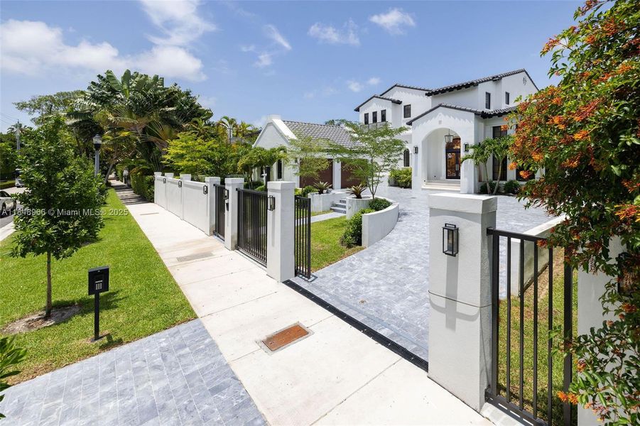 Front exterior of a new home in , Miami Beach, FL, highlighting curb appeal (Image 26). Front exterior of a new home in , Miami Beach, FL, highlighting curb appeal (Image 26).
