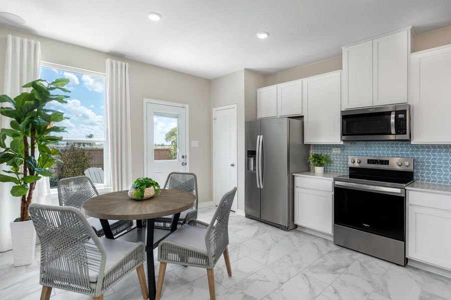 Representative furnished interior of a home built from the Plan 1243 Modeled by KB Home in Medina Crossing, Von Ormy (Image 5). Representative furnished interior of a home built from the Plan 1243 Modeled by KB Home in Medina Crossing, Von Ormy (Image 5).