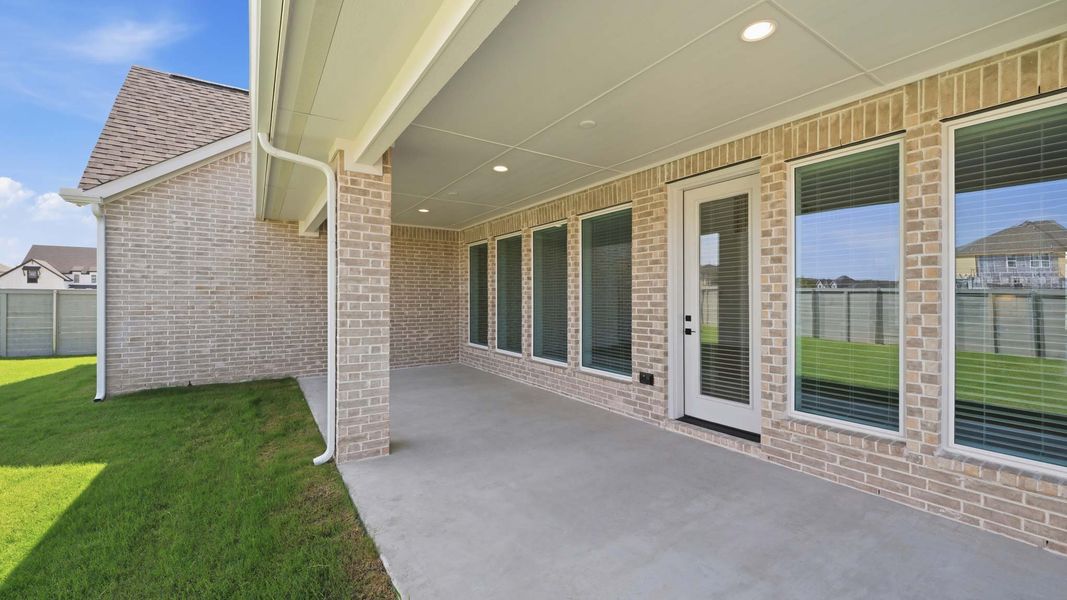 Exterior details and patio area of a home in Landmark, Denton (Image 3).