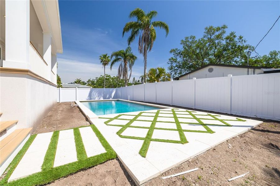 Front exterior of a new home in , St. Petersburg, FL, highlighting curb appeal (Image 27).