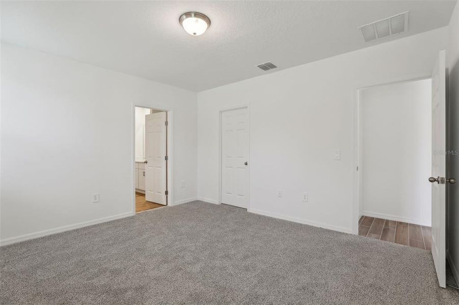 Spacious, unfurnished interior of a new home in Lawson Dunes - Signature Series, Haines City (Image 32).