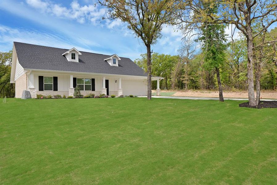 Exterior details and patio area of a home in , Poolville (Image 17).