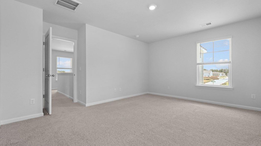 Spacious, unfurnished interior of a new home in Pine Hills at Cane Bay, Summerville (Image 30).