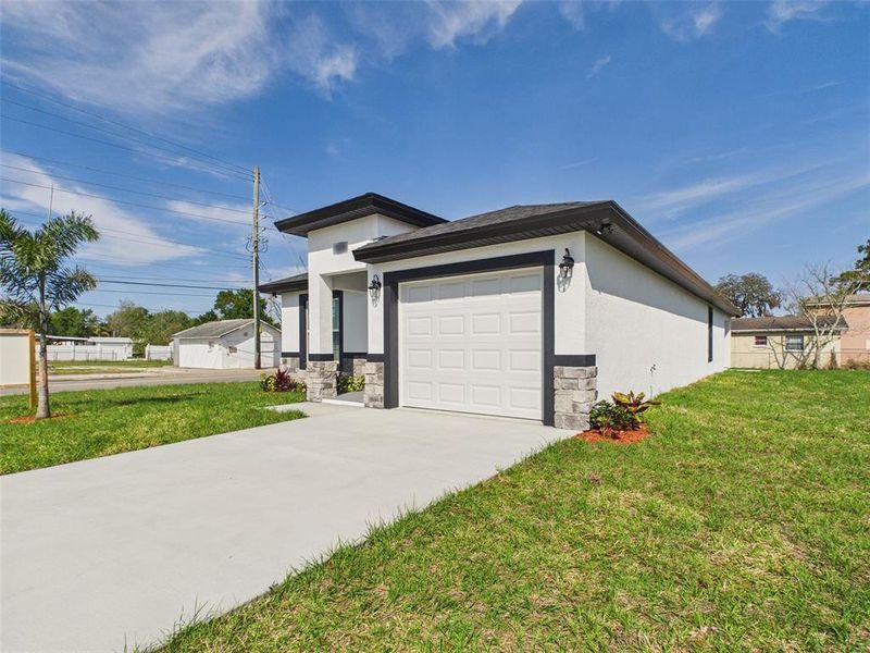 Front exterior of a new home in , Lakeland, FL, highlighting curb appeal (Image 20). Front exterior of a new home in , Lakeland, FL, highlighting curb appeal (Image 20).