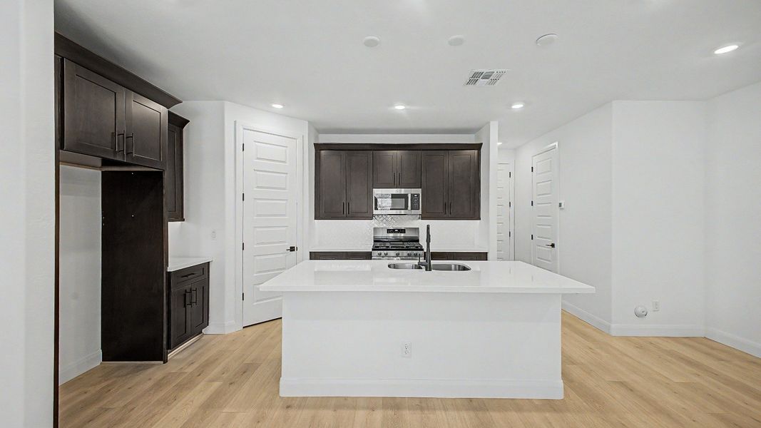 Furnished interior view inside a new home in Flora at Surprise City Center, Surprise (Image 19).