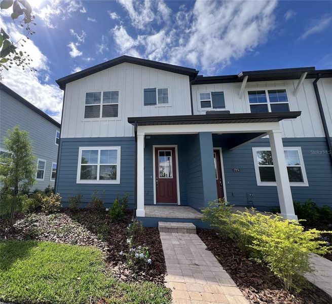 Exterior details and patio area of a home in Northlake Townhomes, Winter Garden (Image 2). Exterior details and patio area of a home in Northlake Townhomes, Winter Garden (Image 2).