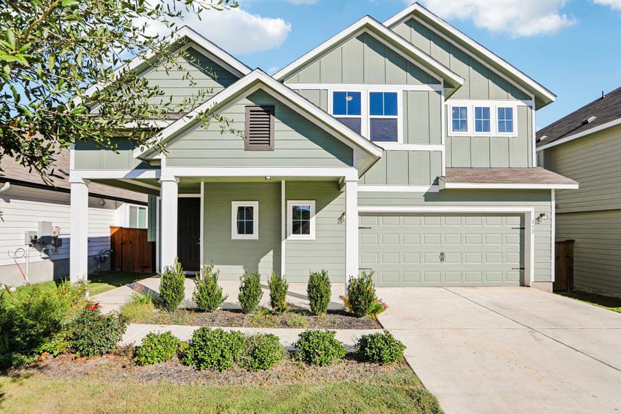 Front exterior of a new home in Orchard Ridge, Liberty Hill, TX, highlighting curb appeal (Image 2).