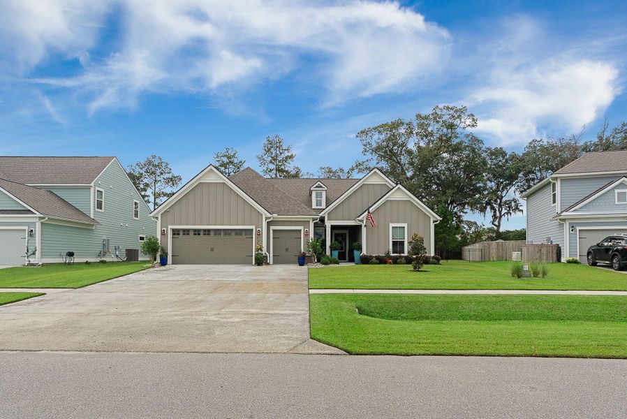 Front exterior of a new home in Sea Island Preserve, Johns Island, SC, highlighting curb appeal (Image 26).